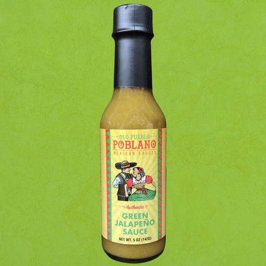 Bottle of Old Pueblo Poblano Green Jalapeno Sauce on a green background