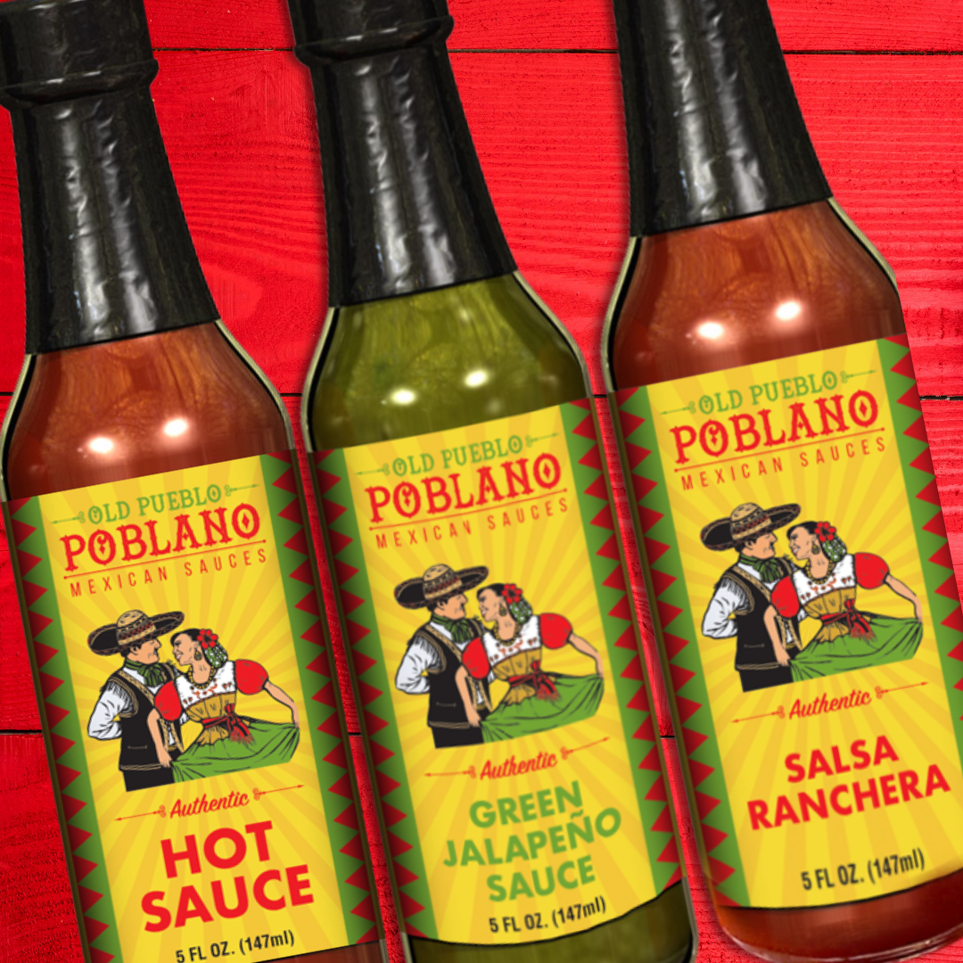 Three bottles of Old Pueblo Poblano hot sauce, with labels indicating different flavors: Hot Sauce, Green Jalapeno Sauce, and Salsa Ranchera.